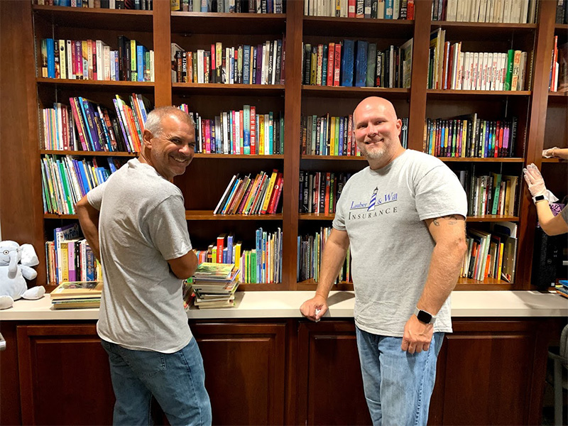 Community Involvement - Lauber and Will Team Members Helping Out at Local Library